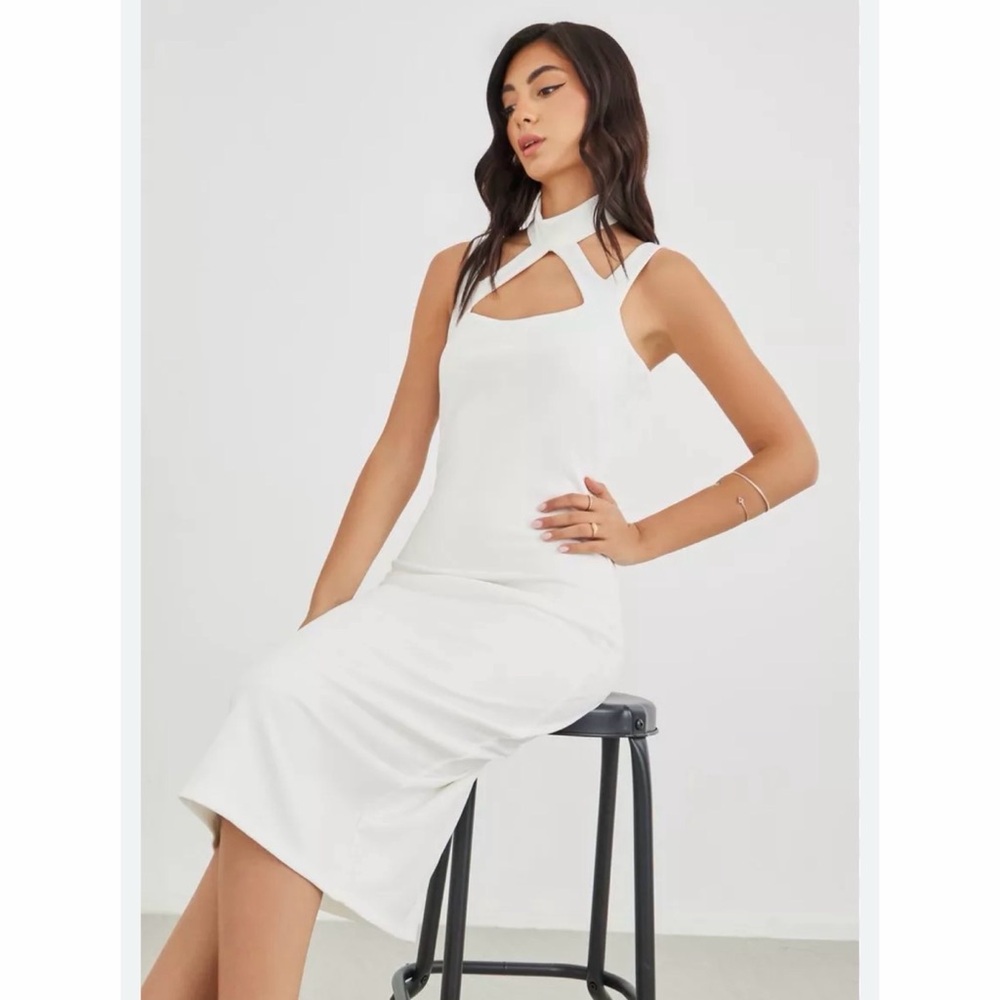 New white sleeveless dress.
